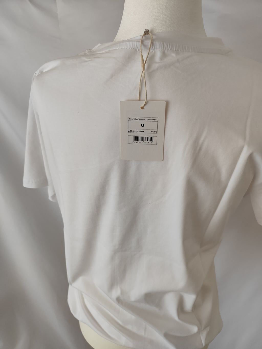 T-shirt branca estampada com cães coloridos